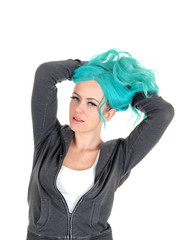 Blue hair woman messing up hair.