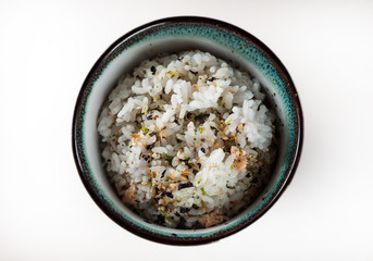 A bowl of rice on a white background.
