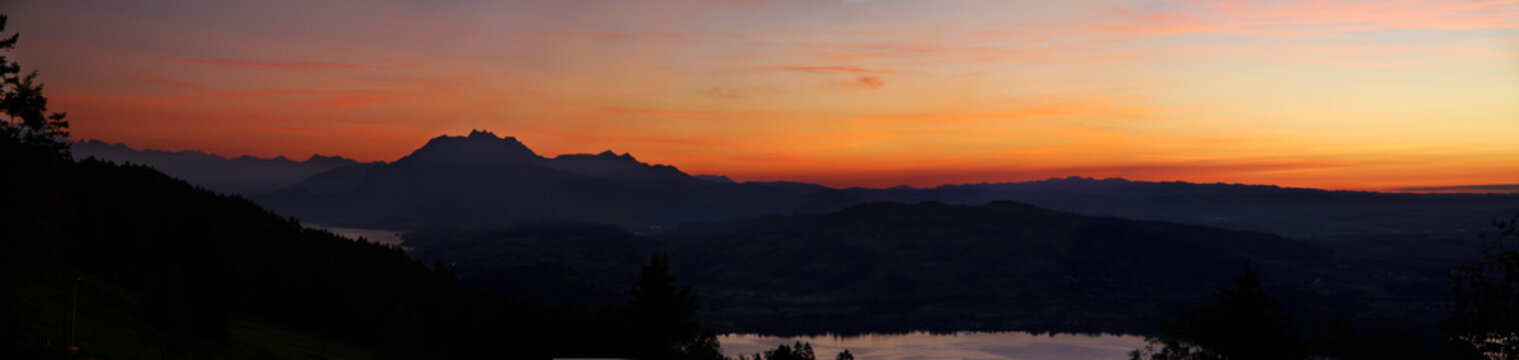 Vibrant Mountain Sunset Over Lake