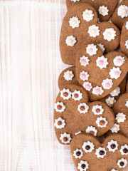 Heart shaped cookies on white wooden background