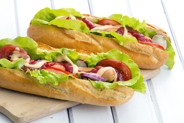 hot dogs on a wooden table