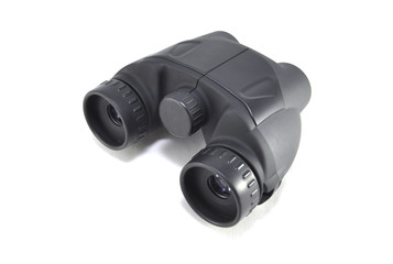 Бинокль на белом фоне крупным планом