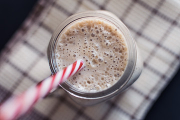 Healthy smoothie. Banana,oats,chia seeds and honey mix. Top view.