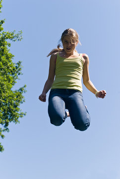 Young girl jumping