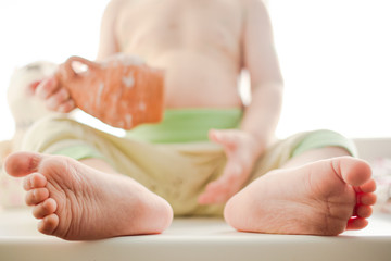 Obraz na płótnie Canvas Feet of a child with congenital flatfoot