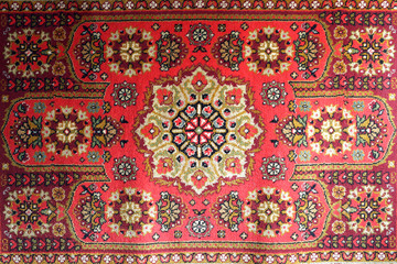 old carpet with national oriental pattern