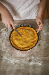preparation of a homemade apple pie, step-by-step, window light