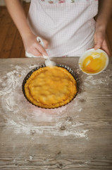 preparation of a homemade apple pie, step-by-step, window light