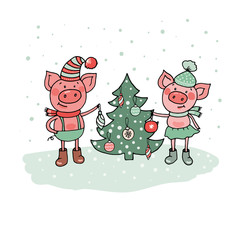 Funny pigs near Christmas tree