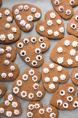 Heart shaped cookies on baking paper background