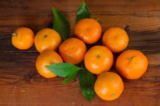 tangerines mandarines fruit top view over wooden background