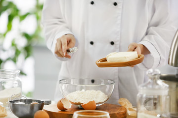 Cooking concept. Professional confectioner making delicious dessert, closeup
