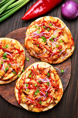 Pizza with chicken meat and vegetables