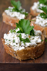Sandwich with wholegrain bread, curd cheese and dill