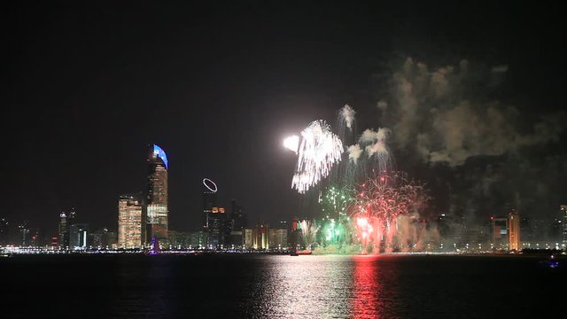 Abu Dhabi skyline with fireworks lighting up the sky as part of 43rd National Day celebrations