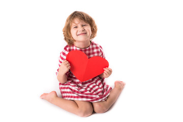 funny Girl child  with red paper  heart,  