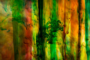 Acrylic colors and ink in water. Abstract background.