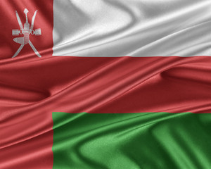 Oman flag with a glossy silk texture.