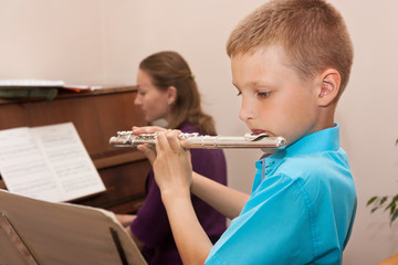 Boy playing the flute
