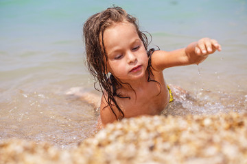 Tanned long-haired boy