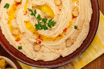 Hummus Dip with Olive Oil. Selective focus.