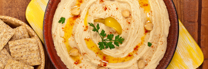 Hummus Dip with Olive Oil. Selective focus.