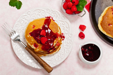 Pancakes with Raspberry Sauce. Selective focus.