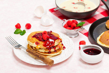 Pancakes with Raspberry Sauce. Selective focus.