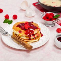 Pancakes with Raspberry Sauce. Selective focus.