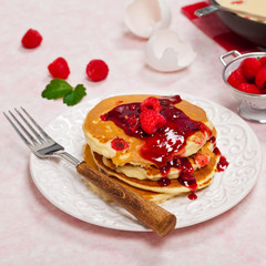 Pancakes with Raspberry Sauce. Selective focus.