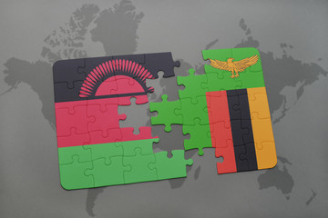 puzzle with the national flag of malawi and zambia on a world map