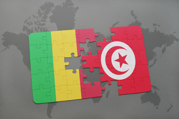 puzzle with the national flag of mali and tunisia on a world map