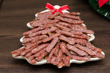 flat sausage in a white plate