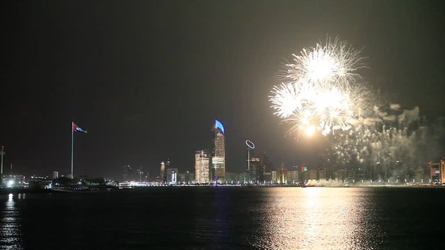 Abu Dhabi skyline with fireworks lighting up the sky as part of 43rd National Day celebrations