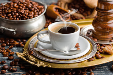 Black coffee on old background