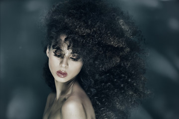 Beauty portrait of girl with afro.