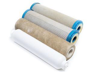 Dirty water filter cartridges on white background