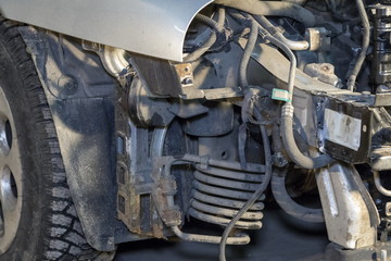 Disassembled car. Various car parts on old automobile