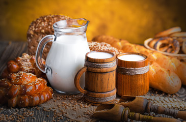 Bread and wheat on the old background