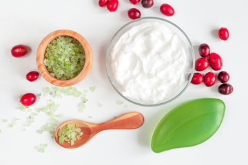 organic cosmetics with extracts of berries white background top view