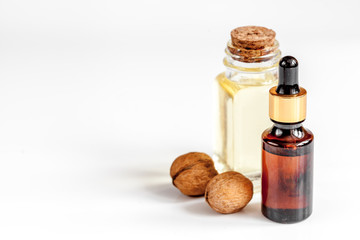 cosmetic and therapeutic walnut oil on white background