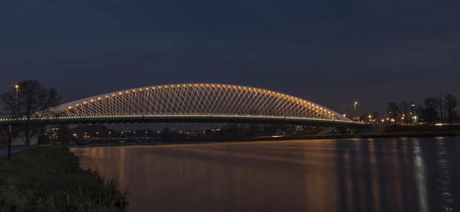 Fototapeta na wymiar Trojsky bridge in winter evening