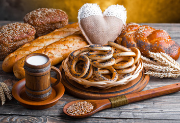 Bread and wheat on the old background
