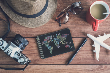 Traveler's accessories and items with black notebook and copy sp