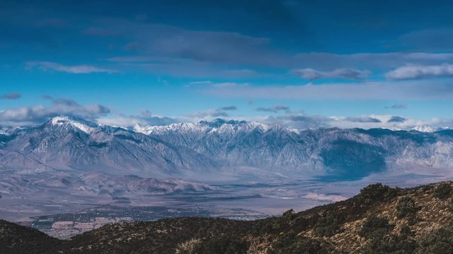 Time lapse clouds travel over the High Sierra Mountains, California.