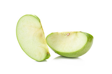 Pieces of green apple isolated on white background