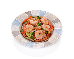 Vegetable stir-fry dishes with shrimps on white background