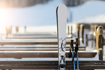 Pair of white skiing in the background of a ski slope.