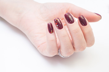 Perfect manicure and natural nails. Attractive modern nail art design. Gel polish applied.