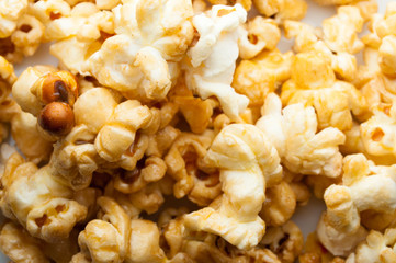 caramel popcorn on a white background
